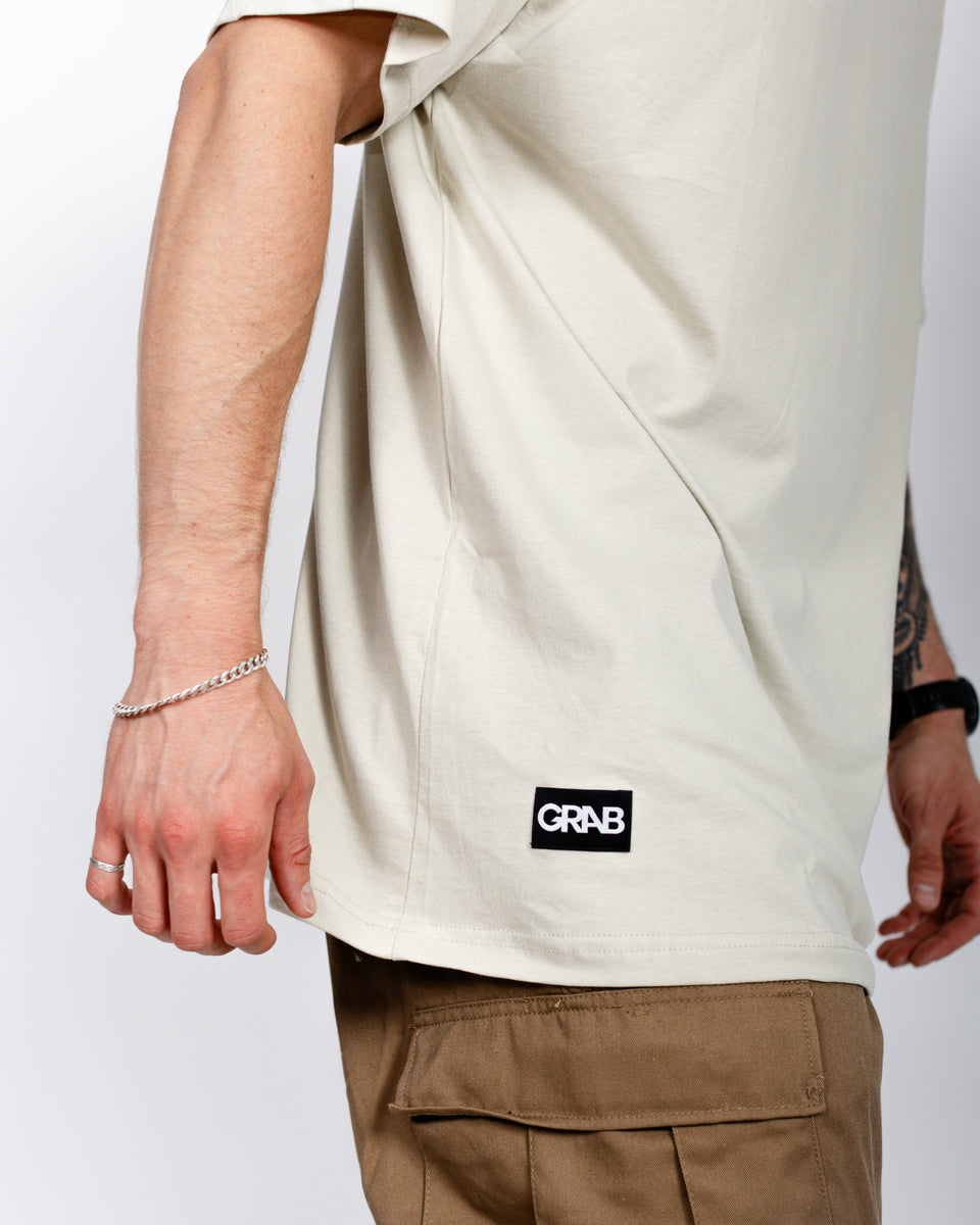 POLERA LONG FIT BEIGE  LABEL